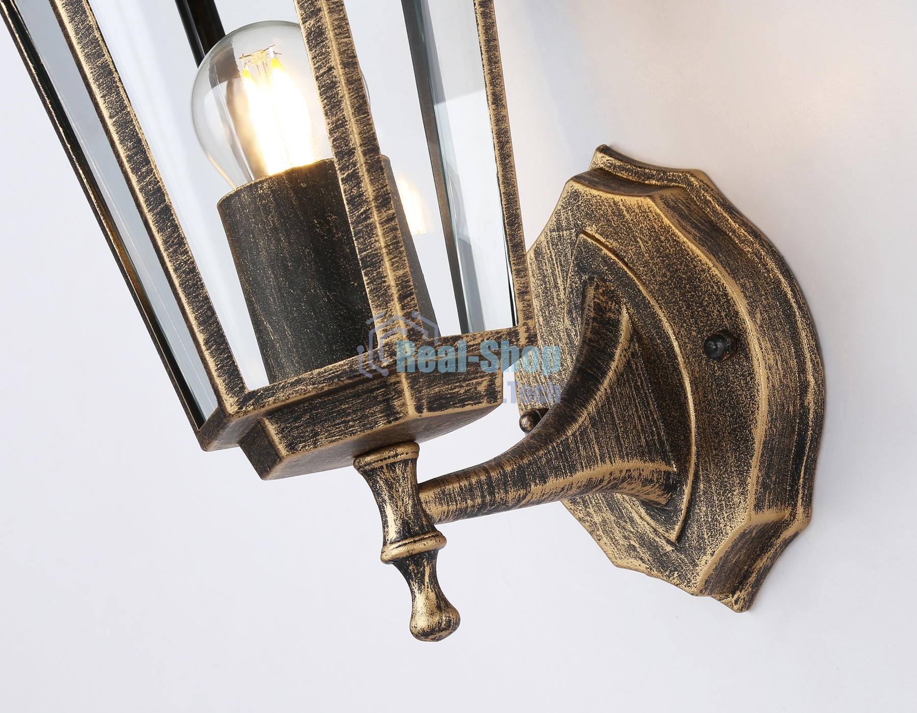 Уличный настенный светильник Ambrella light ST2012 GD/BK/CL золото/черный/прозрачный IP54 E27 max 40W 360*150*210