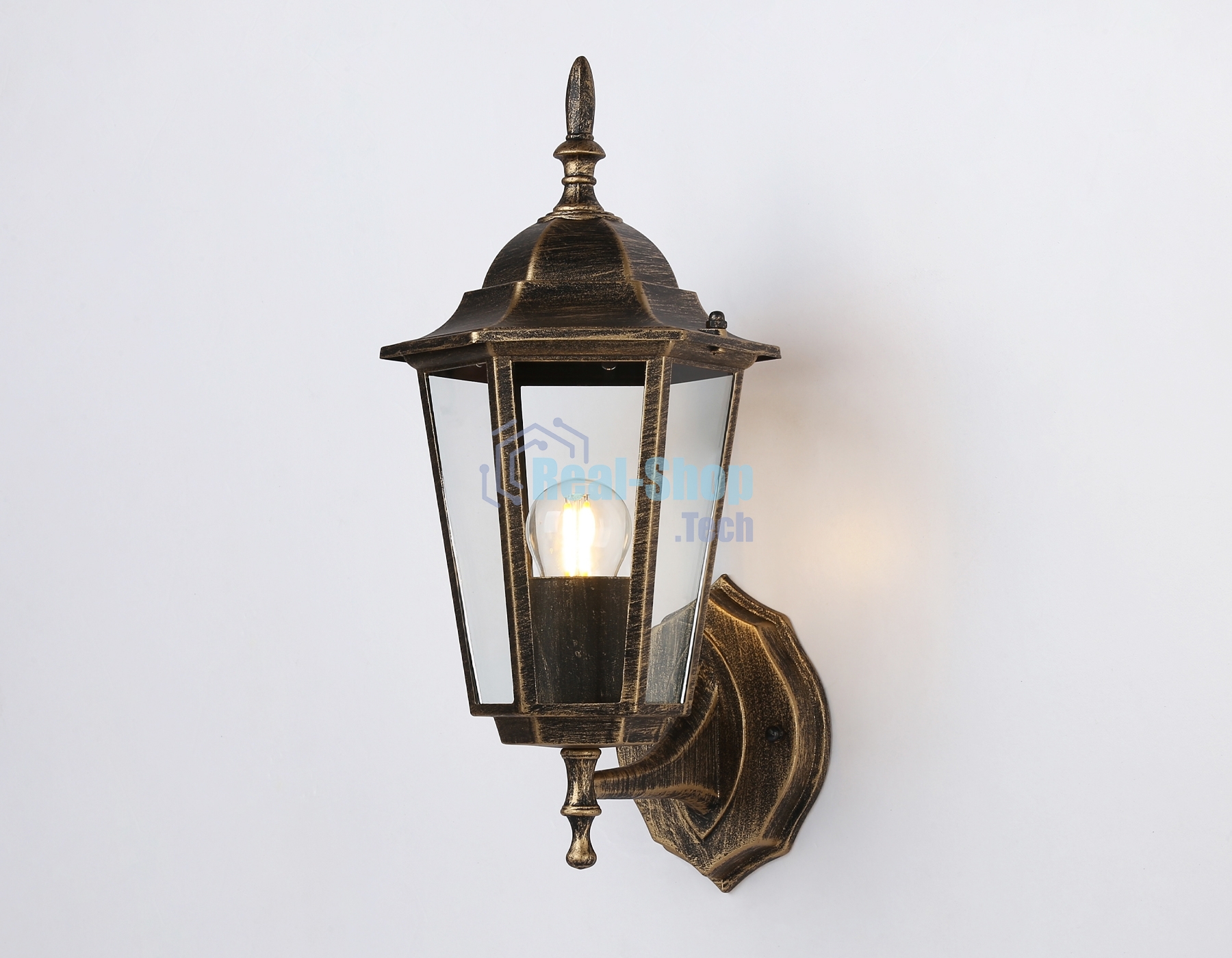 Уличный настенный светильник Ambrella light ST2012 GD/BK/CL золото/черный/прозрачный IP54 E27 max 40W 360*150*210
