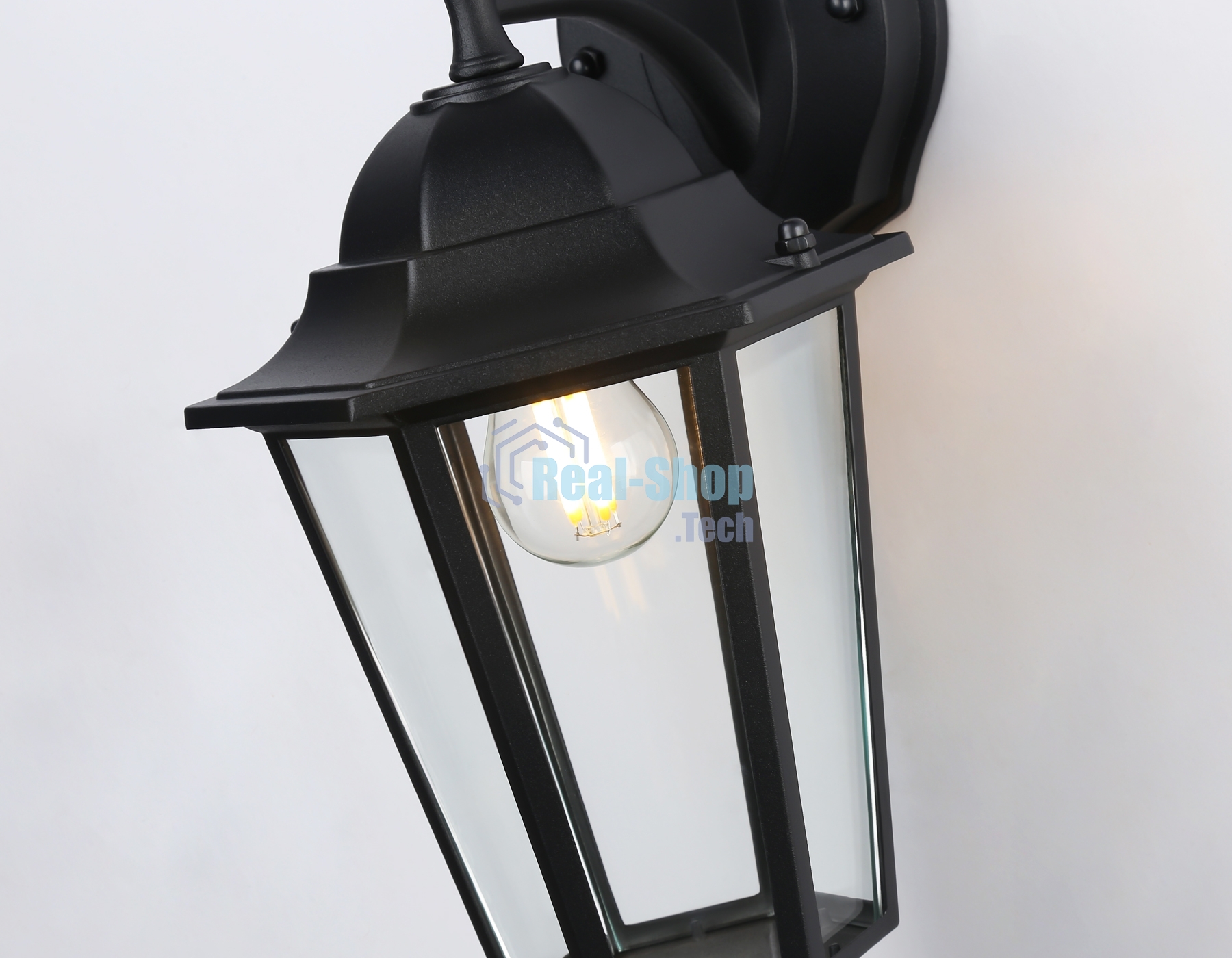 Уличный настенный светильник Ambrella light ST2018 BK/CL черный/прозрачный IP54 E27 max 40W 360*150*210