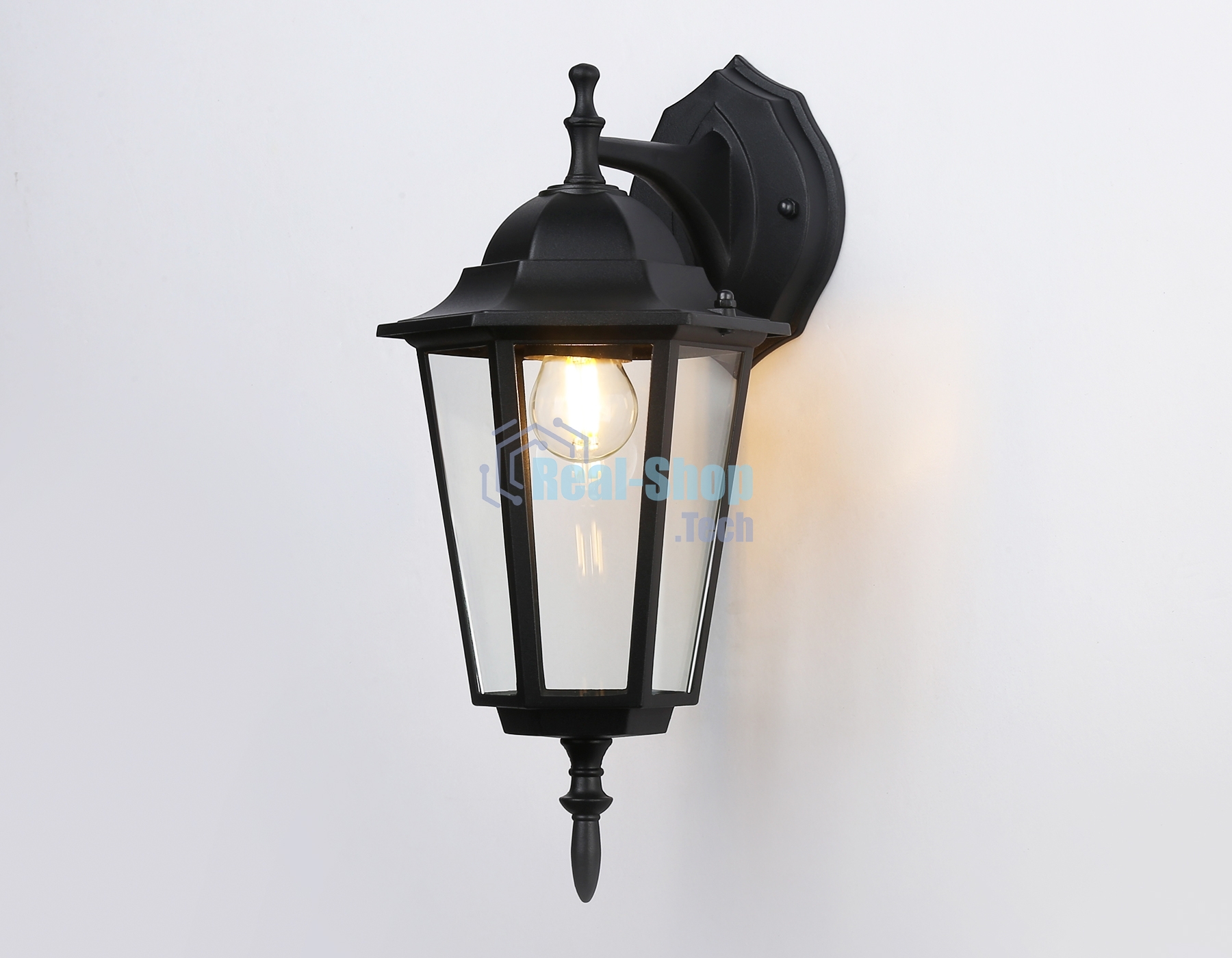 Уличный настенный светильник Ambrella light ST2018 BK/CL черный/прозрачный IP54 E27 max 40W 360*150*210